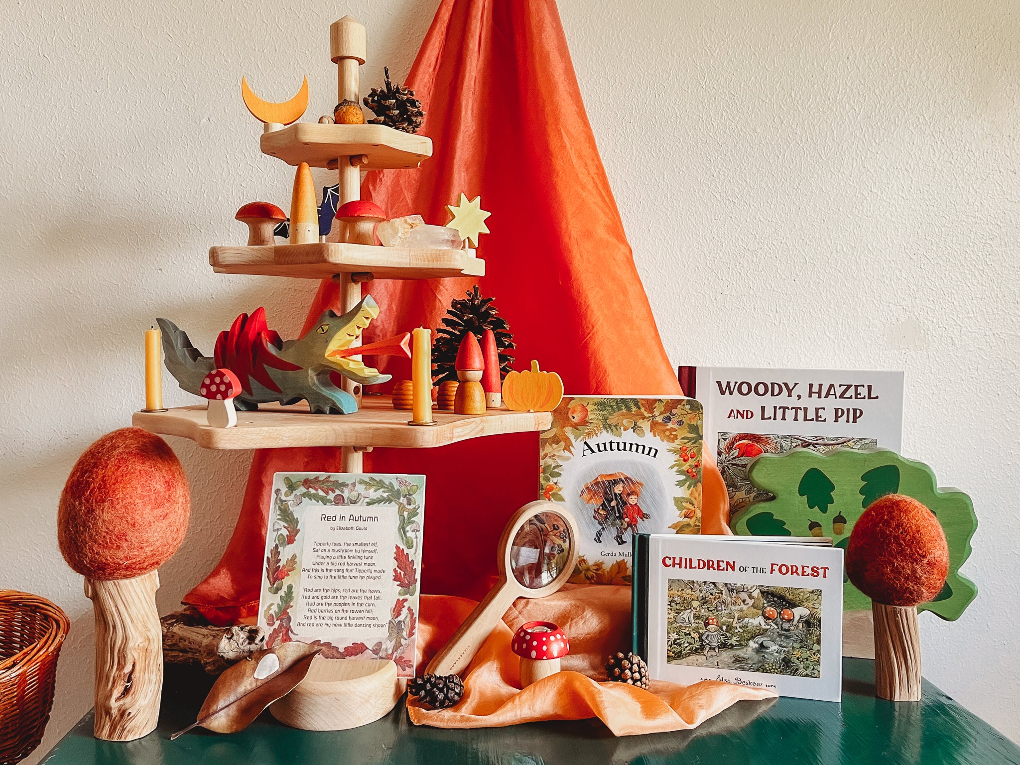 Waldorf Fall Nature Tabue with books, wooden toys, and playsilks